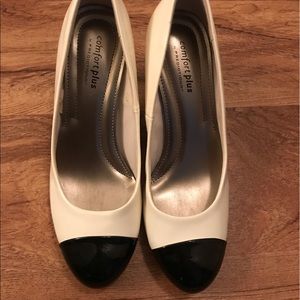 White and black shiny heels